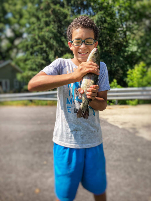 Young Missouri Fisherman Catches First Rainbow Trout