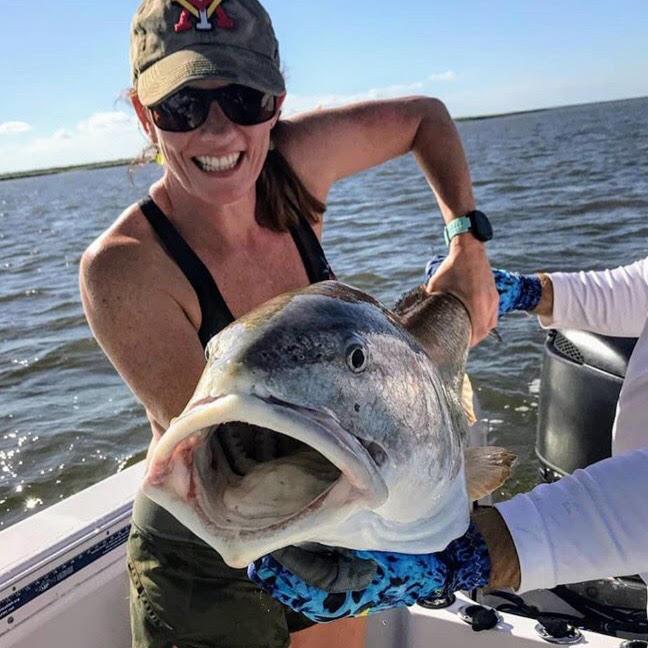 Ann Poysky Catches Huge Red Fish