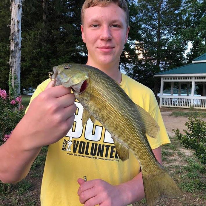 Fisherman Catches Big Small Mouth Bass