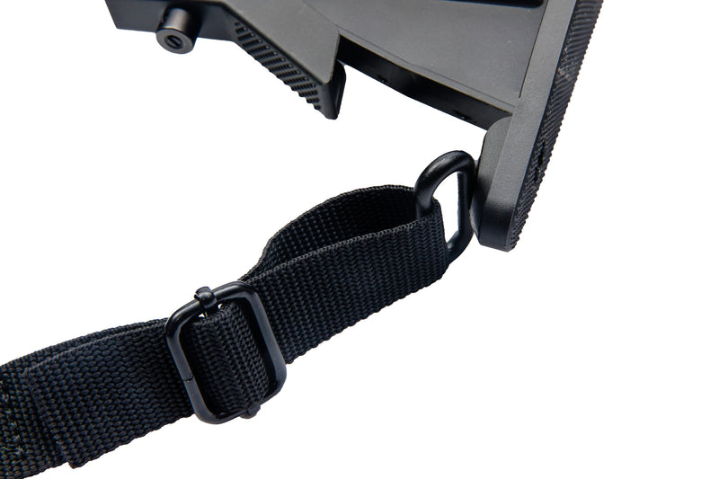 Load image into Gallery viewer, Image demonstrating the TLO Outdoors QD Sling Adapter connecting nylon strap to sling loop
